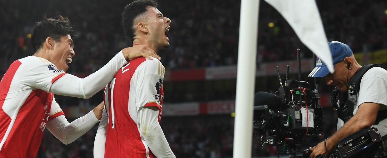 LONDON, ENGLAND - OCTOBER 08: Gabriel Martinelli of Arsenal celebrates with team mates after scoring their sides first goal during the Premier League match between Arsenal FC and Manchester City at Emirates Stadium on October 08, 2023 in London, England. (Photo by Stuart MacFarlane/Arsenal FC via Getty Images)